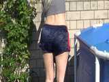 Watch Chloe enjoying her shiny nylon Shorts outside at a sunny Day 6