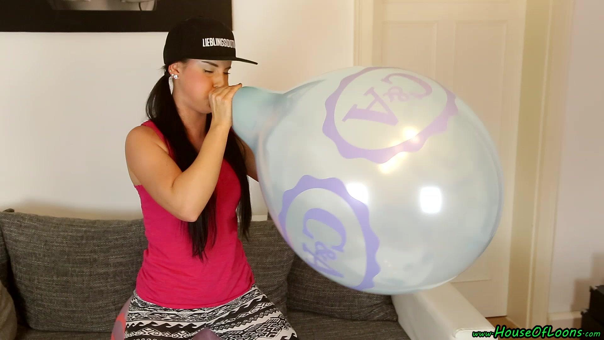 Girl Blowing Balloons