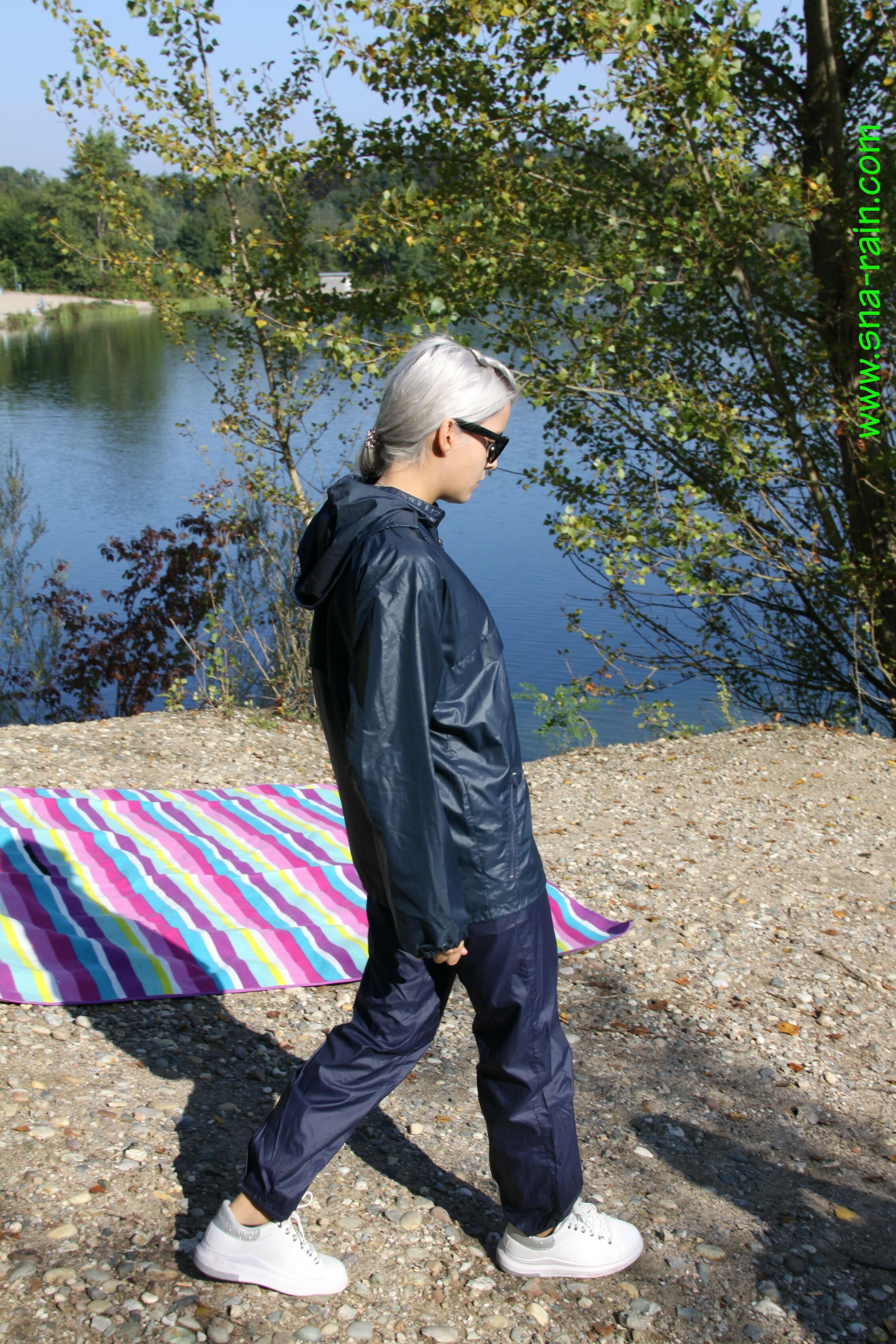 ShinyNylonArts Rain Watch Chloe outside wearing her shiny nylon