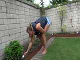Get a video with Sandra gardening in her shiny nylon Downvest 7