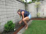 Get a video with Sandra gardening in her shiny nylon Downvest 8