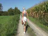 Watch Chloe taking a walk with her shiny nylon Shorts 10
