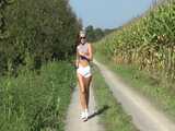 Watch Chloe taking a walk with her shiny nylon Shorts 8