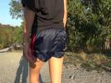 Watch Sandra having a Trip with her Car and doing a Walk in her shiny nylon Shorts 9